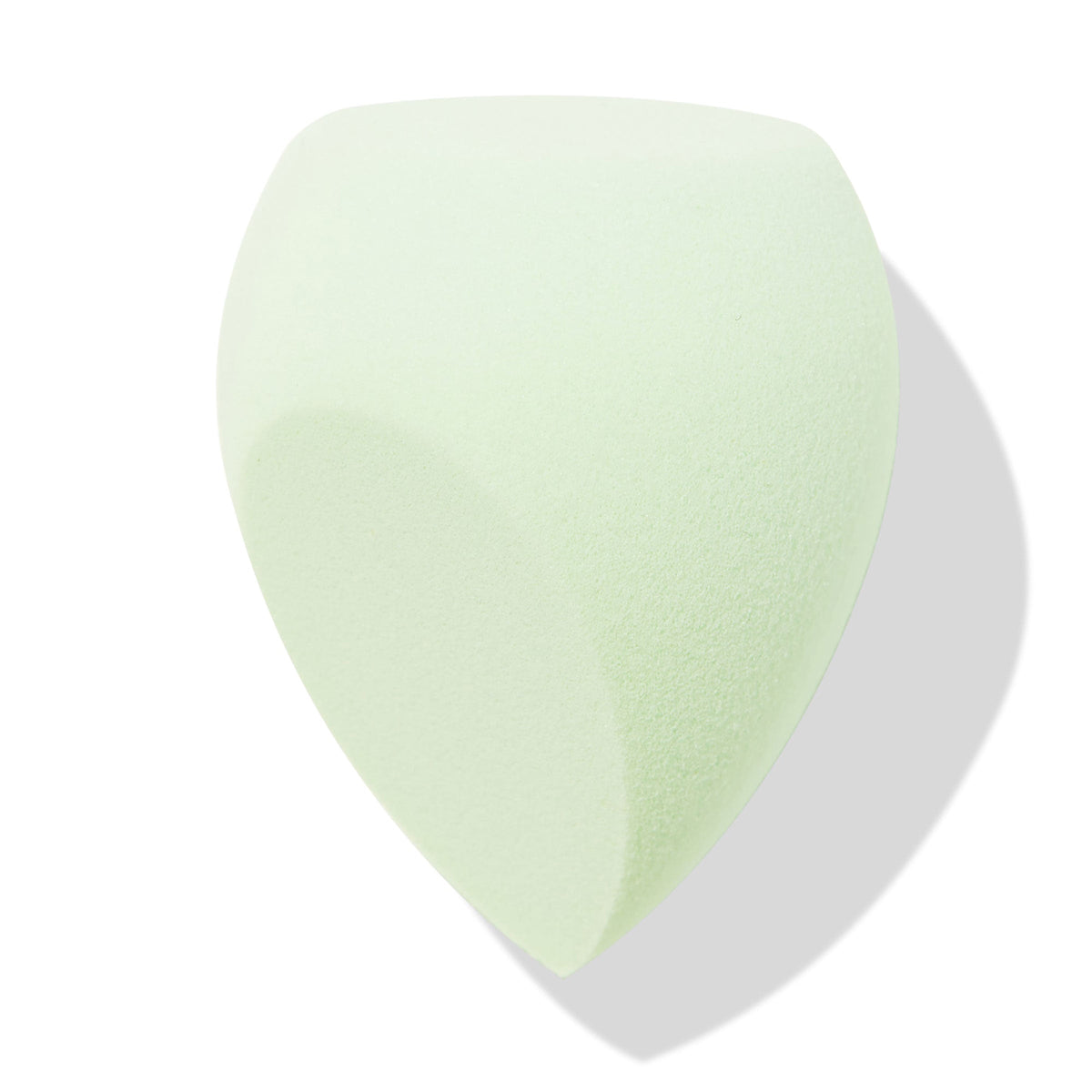 Complexion Blending Sponge angled to show its mint-green, precision-cut flat edge and rounded sides for foundation, concealer, and contour blending on a white background with soft shadow, an ideal ColourPop Makeup Tools & Accessories pick.