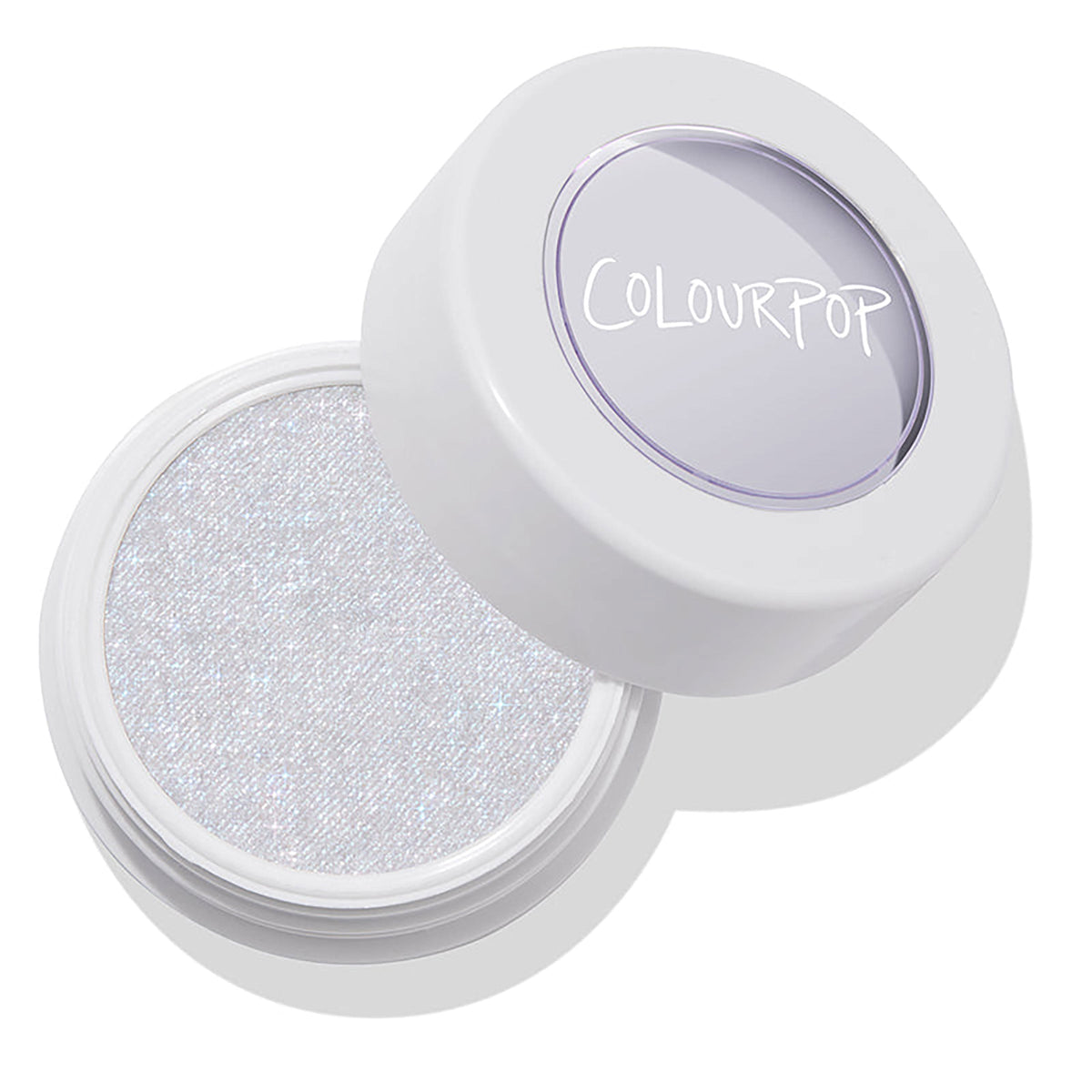 ColourPop Honeymoon Super Shock Highlighter, an icy silver-white shade with blue-lilac shimmer, rests in a round white pot with a clear tilted lid, revealing the bouncy cream formula under studio lighting on a clean white background.