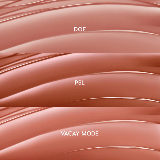 Glossy swatches showcase Lush Pout, ColourPop So Juicy Plumping Gloss Balm with Peptides: three nude-pink shades - Doe (rosy beige), PSL (warm caramel), and Vacay Mode (peachy nude) - layered in curved stripes on a clean backdrop.