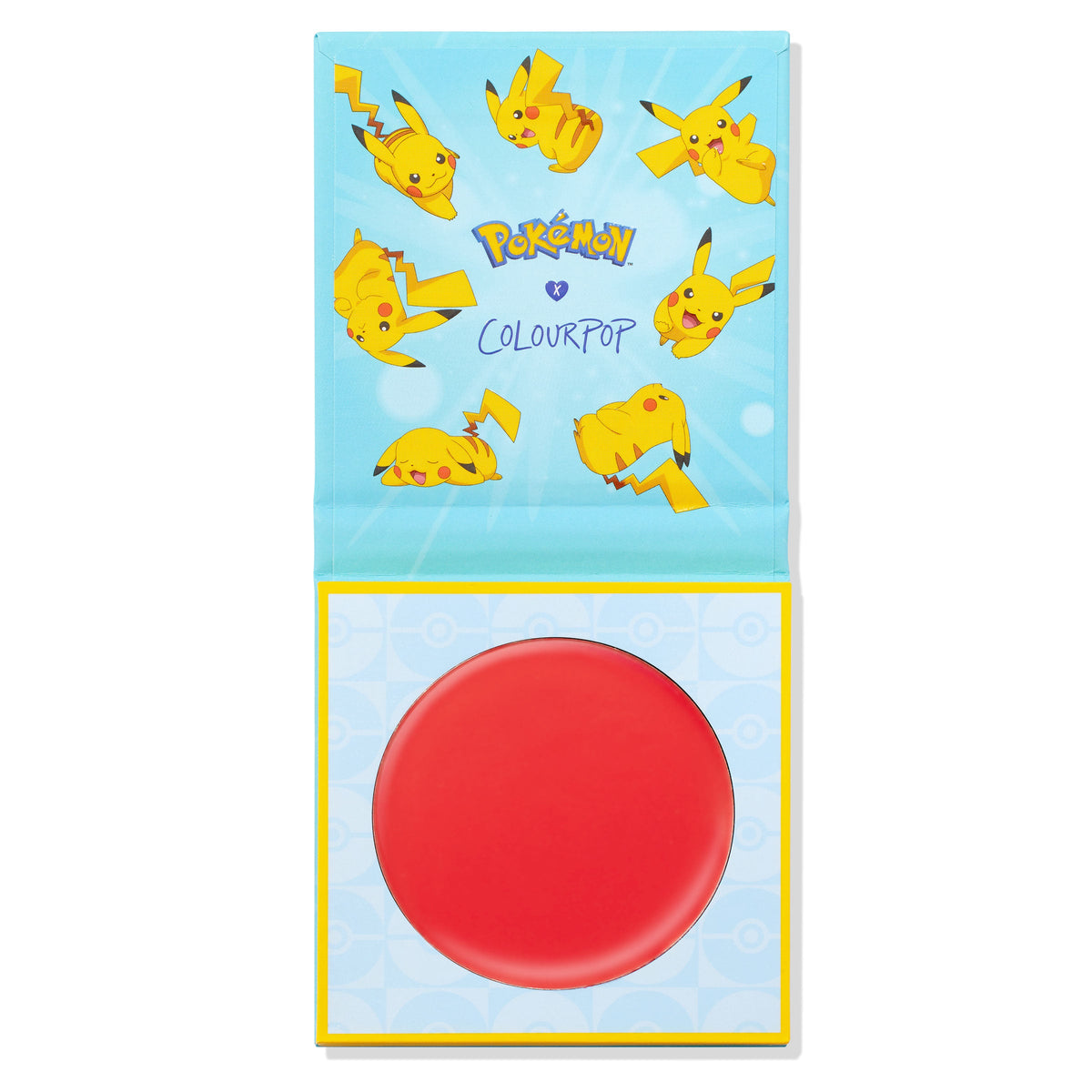 ColourPop ElectroBall cream blush rests in an open light-blue compact decorated with Pikachu and Poké Ball motifs, revealing a bold red pan in a square palette from the Pokémon x ColourPop collaboration.