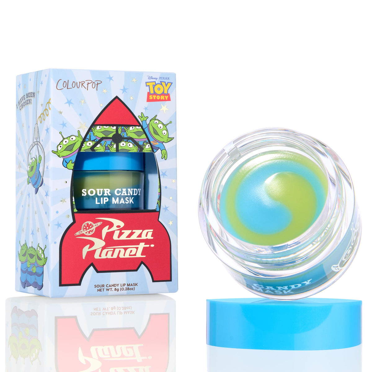 The Chosen One ColourPop Lip Mask shows a clear jar open with a blue and lime-green swirl balm, beside a Toy Story Pizza Planet aliens box labeled Sour Candy Lip Mask, blue cap off to reveal texture for nourishing overnight lip care.