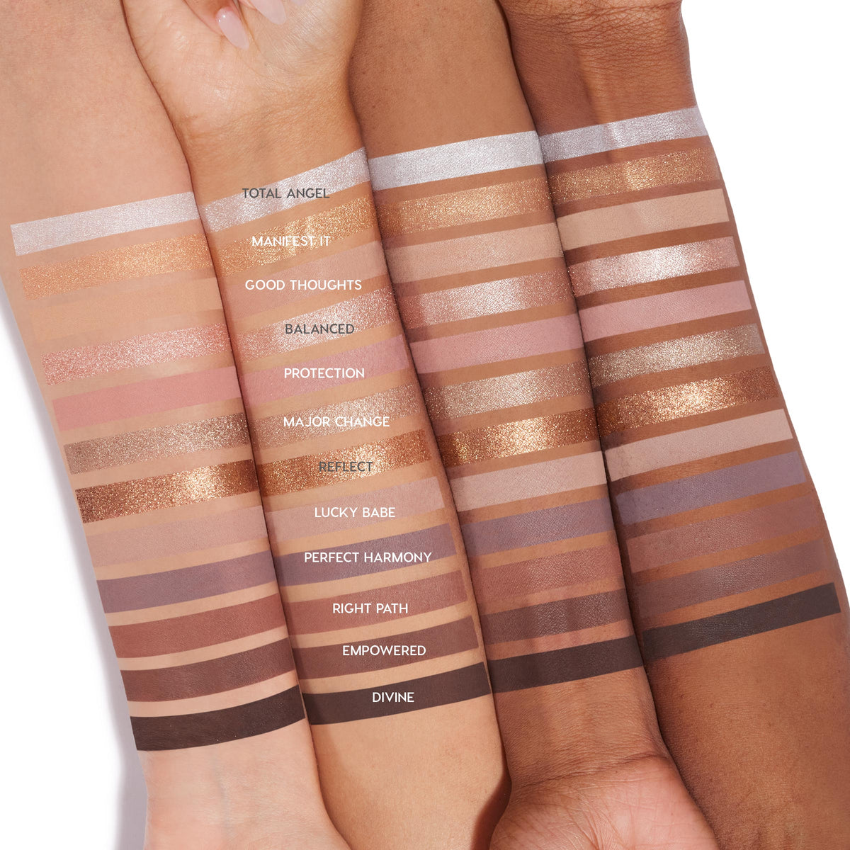 11:11 ColourPop Shadow Palette arm swatches - 12 matte and metallic eyeshadows, from Total Angel (icy silver) to Divine (deep brown) - striped on three skin tones with shade names labeled, photographed on a clean white background.