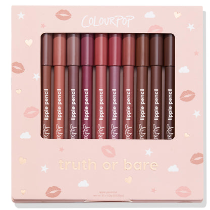 ColourPop Truth or Bare Lippie Pencil kit showcases 10 creamy lip liners in nude, pink, mauve, and brown shades, lined upright behind a clear window in a blush-pink box with hearts, clouds, and lip prints - an everyday neutral gift set.