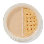 ColourPop No Filter Loose Setting Powder in Banana shown open, yellow-toned powder visible through a square-holed sifter in a clear round jar on a white background, used for brightening and setting makeup.