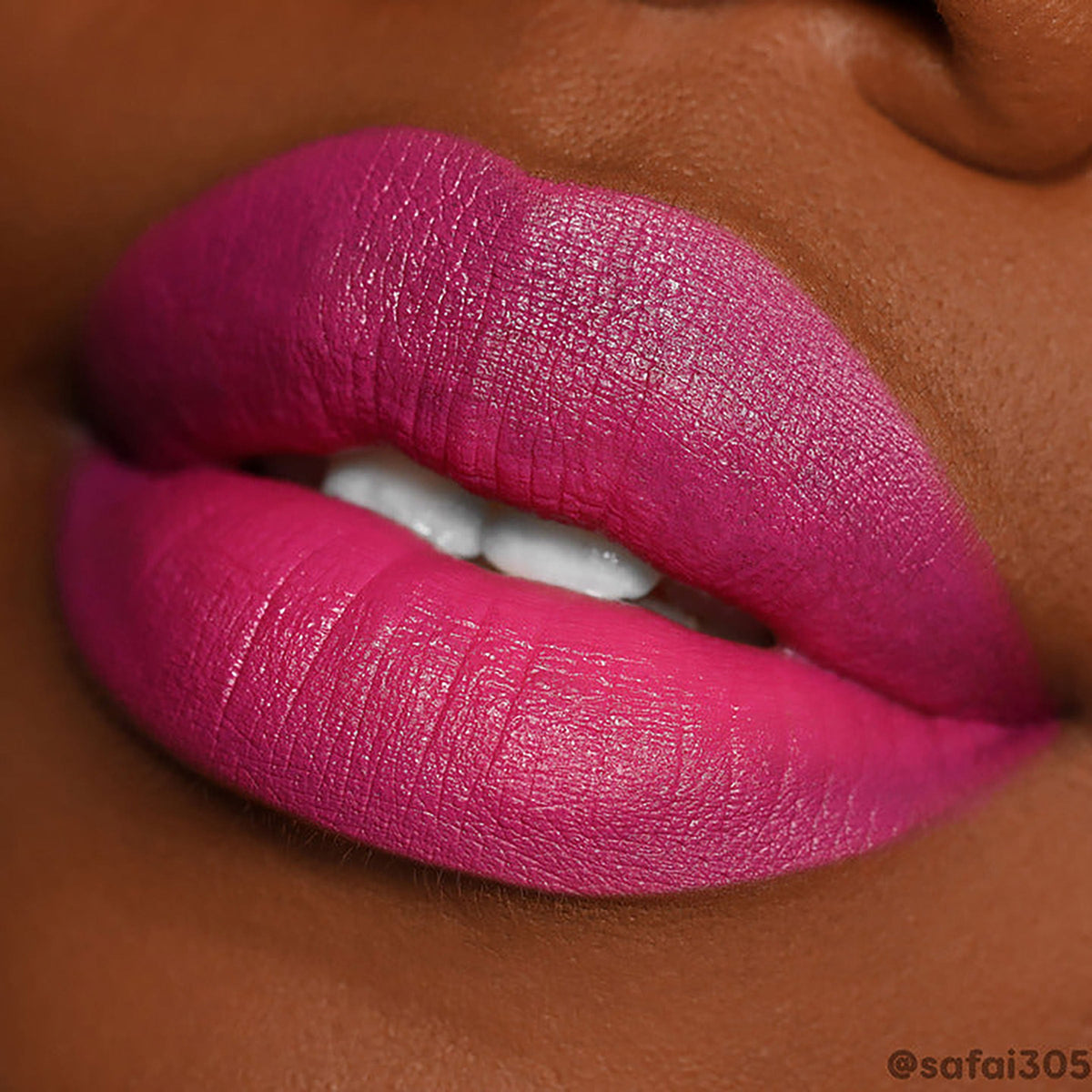 Fuchsia lips lined and filled with ColourPop Lippie Pencil Heart On, showcasing rich matte color, crisp edges, and full coverage in an extreme close-up on deep skin.