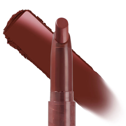 Hot in Here ColourPop Lippie Stix standing uncapped with the rounded bullet forward, a wide brick red-brown swatch swept behind it to show rich, creamy payoff against a clean white background.