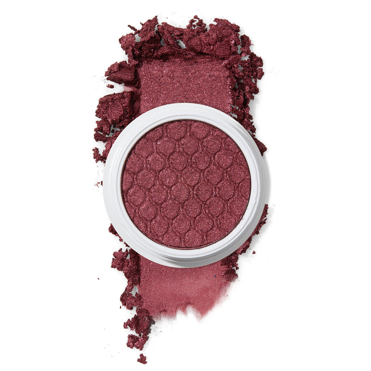 ColourPop Drift Super Shock Shadow featuring a metallic cranberry-burgundy shimmer in a round white pot with honeycomb imprint, crushed pigment smeared in a bold swatch on a white background to show color payoff.