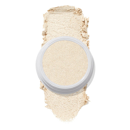 ColourPop Stole the Show Super Shock Highlighter in a round white pot sits atop a thick champagne‑pearl swatch on a white background, showing its luminous shimmer finish for face highlighting.