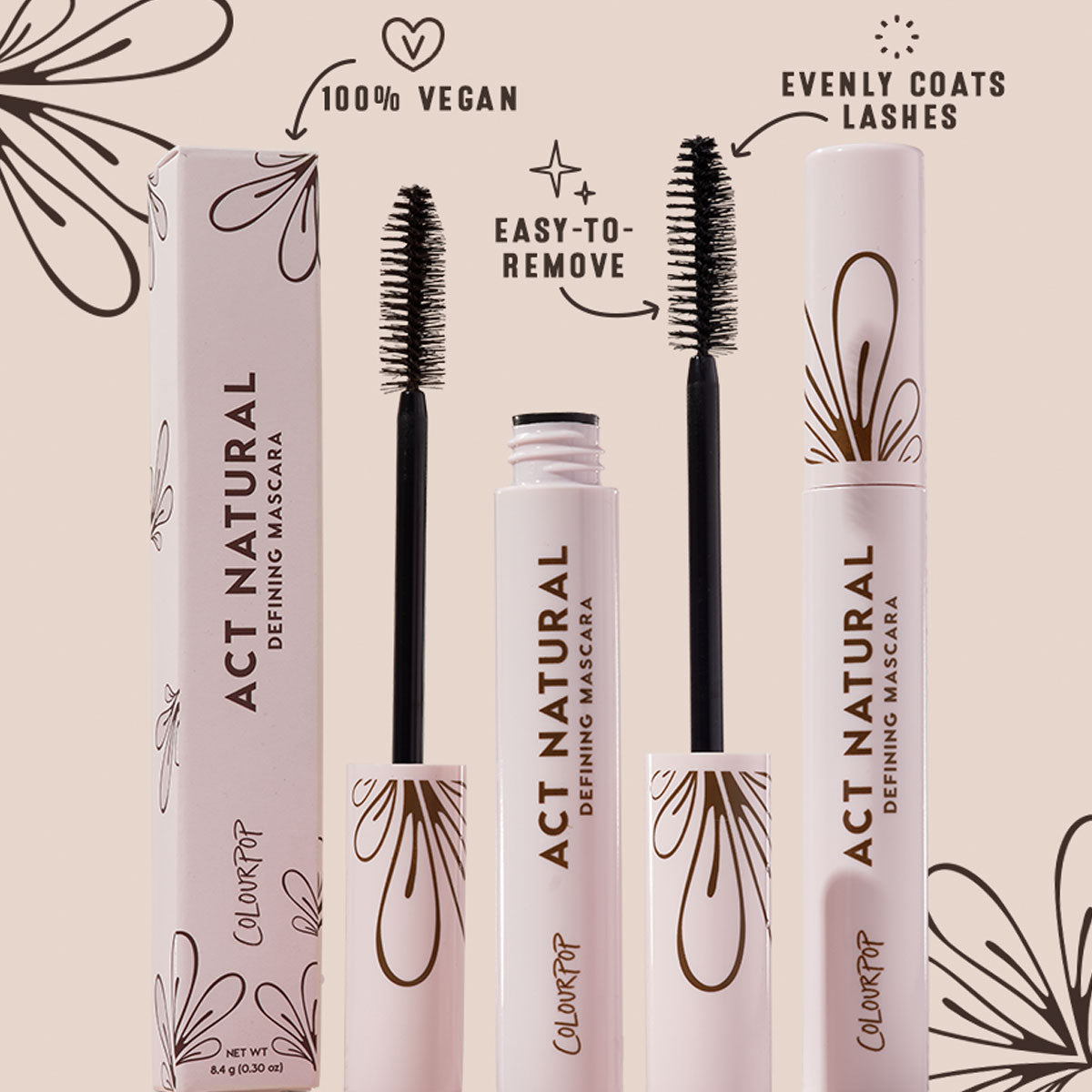 ColourPop Act Natural Mascara, Brown, displays an open tube with dense spoolie beside a closed tube and box, highlighting 100% vegan, easy-to-remove, evenly coats lashes; soft pink packaging with brown floral accents on a beige backdrop.