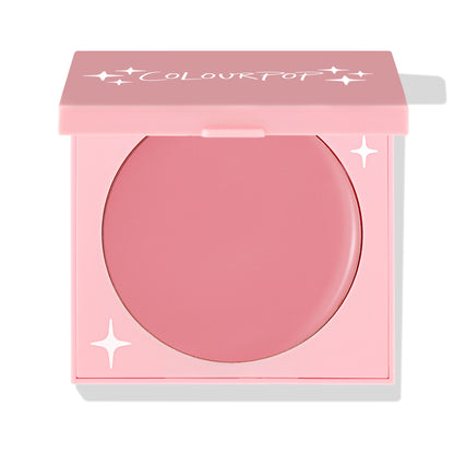 ColourPop Angel Energy cream blush compact opens to reveal a rosy pink pan, shown half-open in a square pastel-pink case with white star details and COLOURPOP logo on the lid, a ColourPop Cream Blush product on a clean white background.