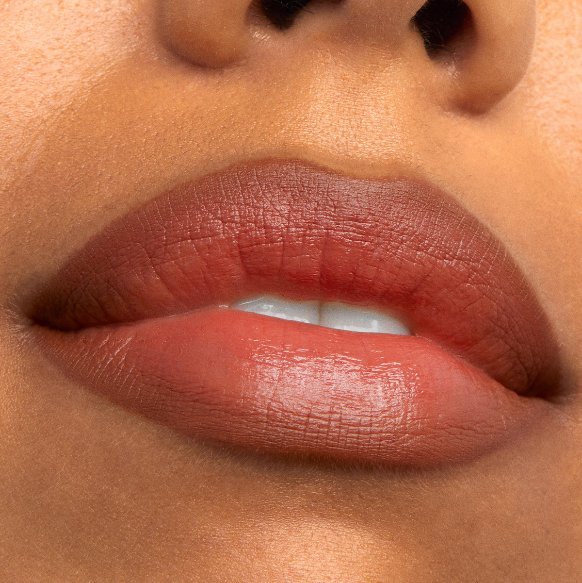 Full lips lined and softly filled with BFF3, a warm terracotta-brown ColourPop Lippie Pencil, showing precise edges and a smooth satin finish in a tight beauty swatch close-up.