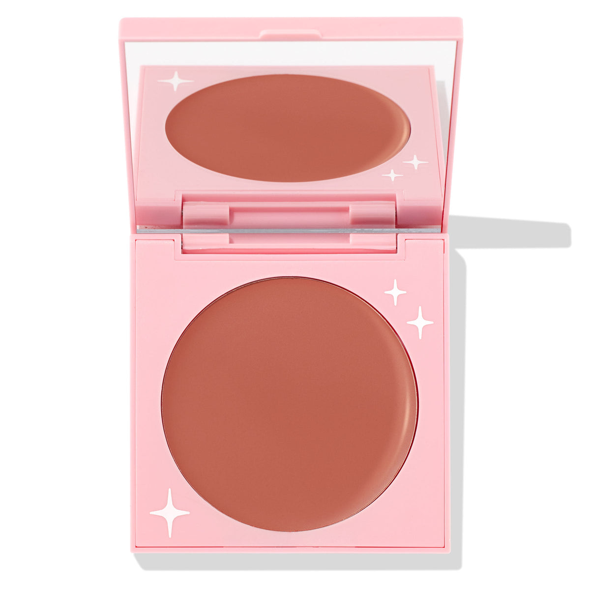 Bali Baby ColourPop Cream Blush opens to reveal a matte rosy-nude pan in a light pink compact with white star accents and a built-in mirror, studio-lit on a white background.
