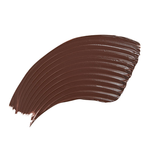 ColourPop Act Natural Mascara in Brown swatched in a smooth, curved swipe, showing rich chocolate-brown pigment with fine ridged brush lines on a clean white background.
