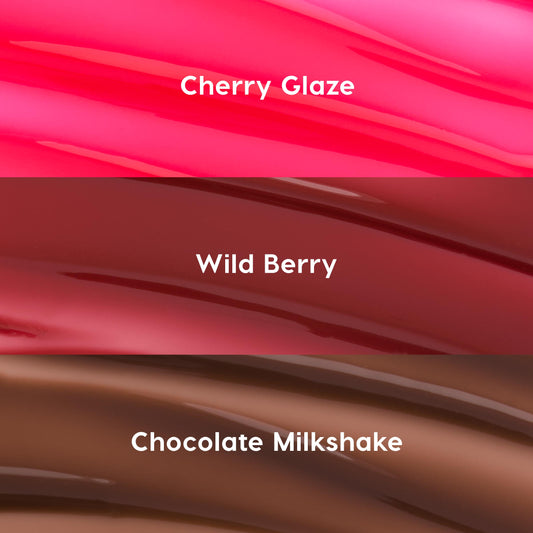 Glossy swatches show Get Rich ColourPop Glossy Lip Balm Trio - Cherry Glaze (vivid pink), Wild Berry (deep berry red), and Chocolate Milkshake (sheer cocoa brown) - streaked in three horizontal bands to preview shade and shine.