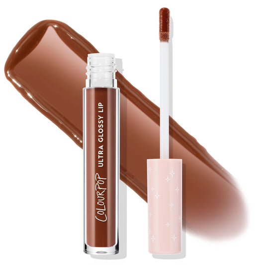 Coffee Break Ultra Glossy Lip by ColourPop TTS Exclusive stands open, clear tube showing the cocoa-brown shade while the doe-foot applicator lifts product; a wide brown swatch and a blush-pink star-print cap highlight the high-shine finish on white.