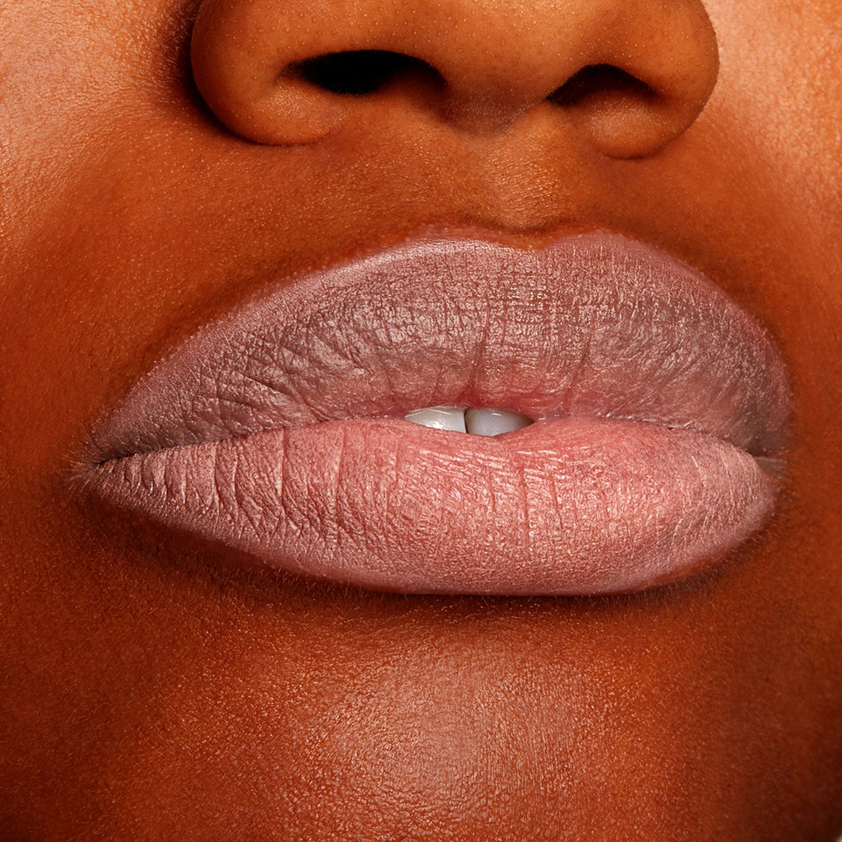 Lips wear Cool BFF, a cool-toned pink-beige ColourPop Lippie Pencil, lining and filling the lips for a smooth matte finish in a tight studio close-up.