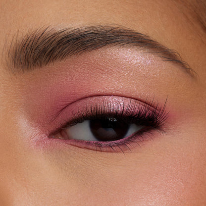 Rosy eyelid wears blended matte and shimmery pinks from the Cloud Spun shadow palette, lashes softly defined in a macro close-up, showcasing soft pastel glam - ColourPop Shadow Palette.