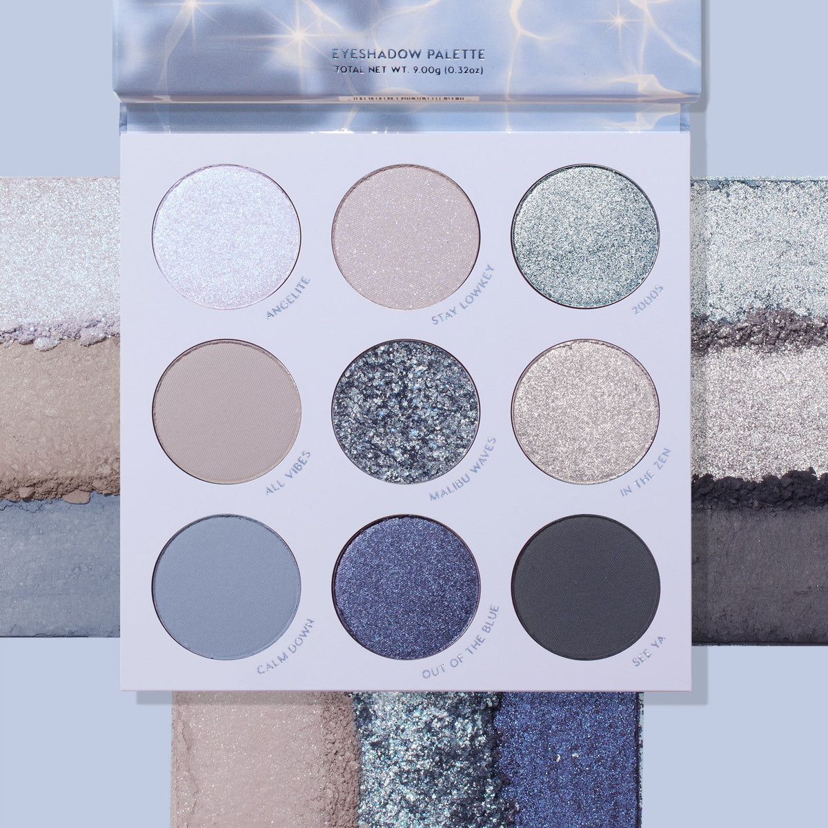 ColourPop Shadow Palette So Elemental opens to reveal a nine-pan range of cool tones - icy silver, champagne, seafoam shimmer, matte beige, silver glitter, taupe shimmer, dusty blue, navy sparkle, and charcoal matte - set over coordinating swatch stripes.