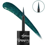 ColourPop Graphix Ink Liner in Forever swatched as a curved stroke of shimmering teal glitter, shown with a fine brush tip and inset close-up next to a black barrel with white script on white, highlighting precise, long‑wear liquid eyeliner.