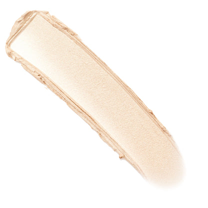 Glazey ColourPop Lite Stix swatch swept diagonally on a white background, revealing a creamy champagne‑beige stripe with fine pearly shimmer and soft edges, showing the stick highlighter’s smooth payoff and luminous finish.