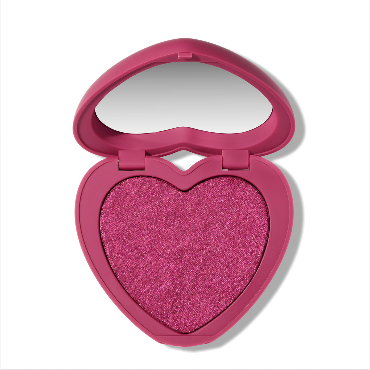 Heart to Get Cuter than Cupid Super Shock Blush compact showing a shimmery hot pink heart-shaped blush pan inside a matching heart case with mirror, styled on a clean white background for US makeup lovers