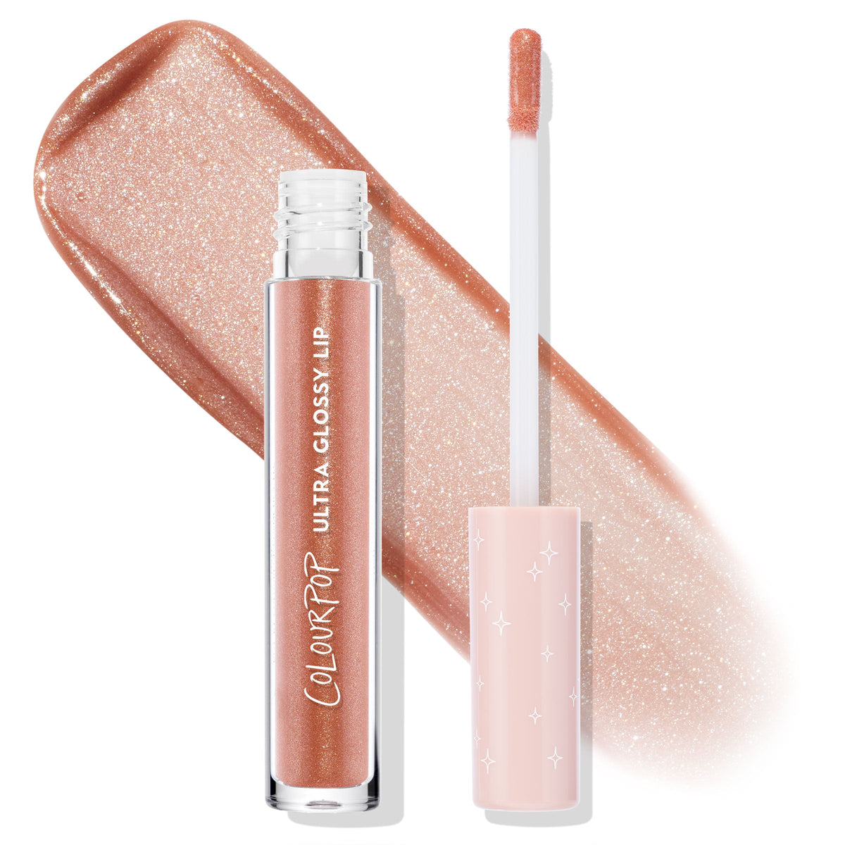 ColourPop Ultra Glossy Lip It Girl shown uncapped with doe-foot applicator and star-print pink cap, set over a peachy nude, glittery swatch, highlighting the high-shine finish and clear tube branding.