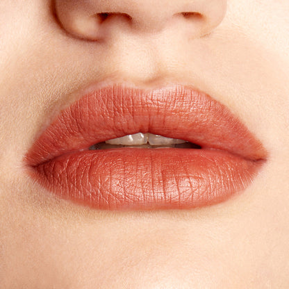 Full lips wear ColourPop Lippie Pencil BFF2, a warm nude terracotta lip liner outlining and filling with a creamy satin‑matte finish, shown in a studio close-up.