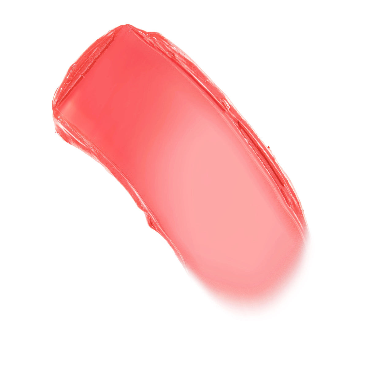 Coral-pink balm swatch curving across a white background, showing sheer, dewy payoff and creamy texture for the ColourPop Lip and Cheek Balm in It's a Look shade.