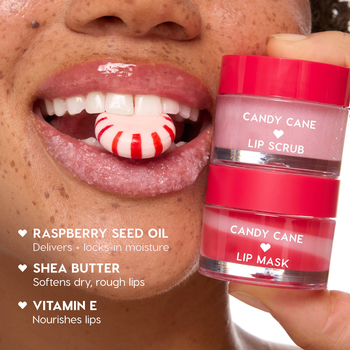 Colourpop Candy Cane Lip Mask and Lip Scrub jars, stacked beside glossy lips holding a red-and-white peppermint, highlight a pink holiday formula with sugar crystals and callouts for raspberry seed oil, shea butter, and vitamin E to soften and nourish lips.