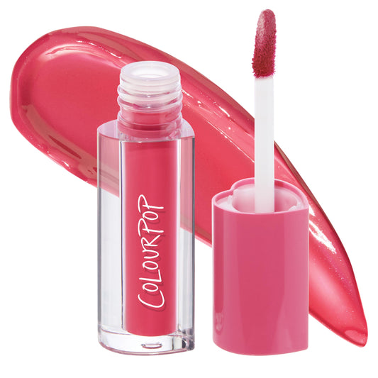 ColourPop Lip Stain in Juice Box, a vibrant raspberry-pink tint, shown with cap off as the white doe-foot applicator rests beside the clear tube with pink cap, a glossy swatch swept behind to show payoff on a white studio background.