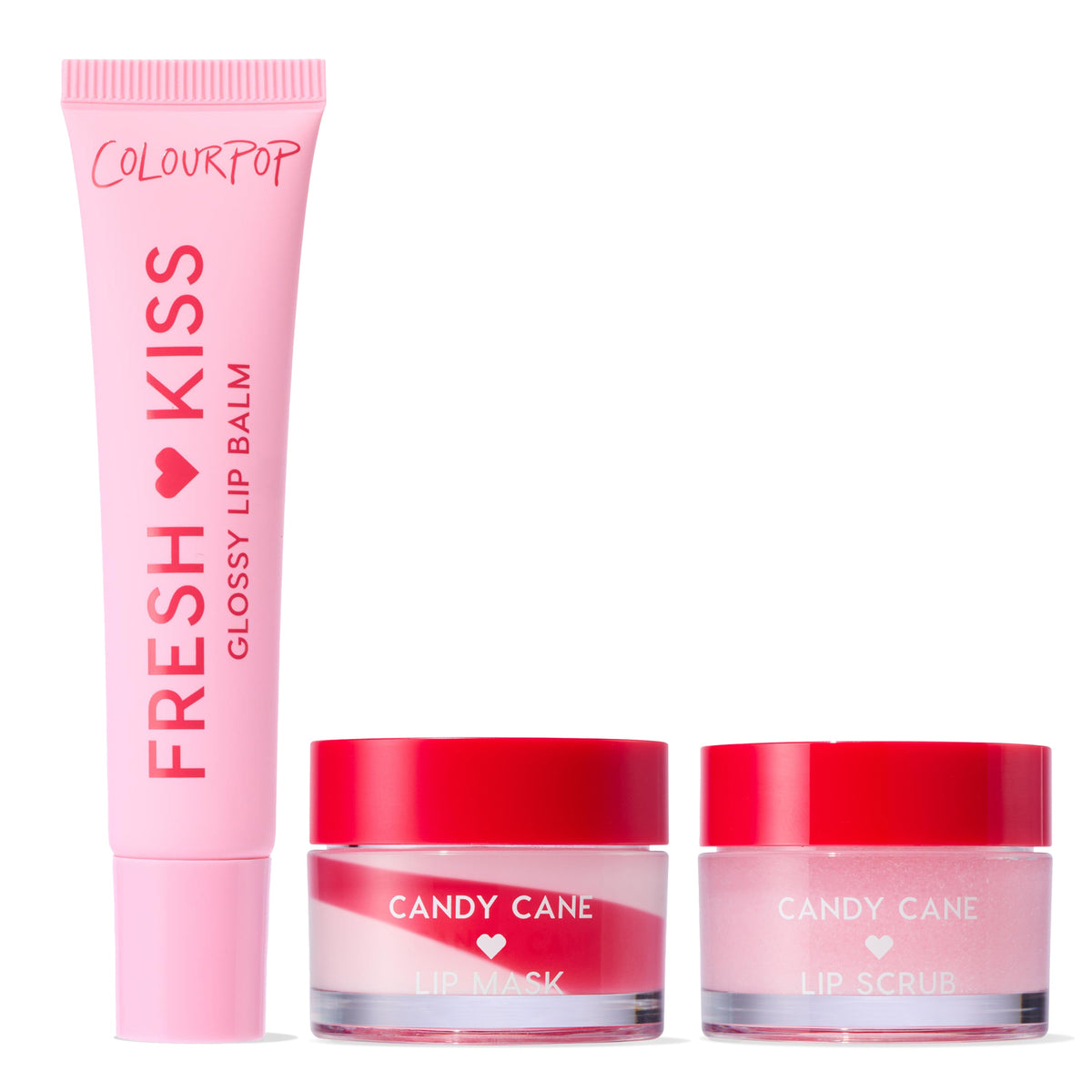 Pink lip balm tube labeled 'Fresh Kiss' and two red containers labeled 'Candy Cane' on a white background