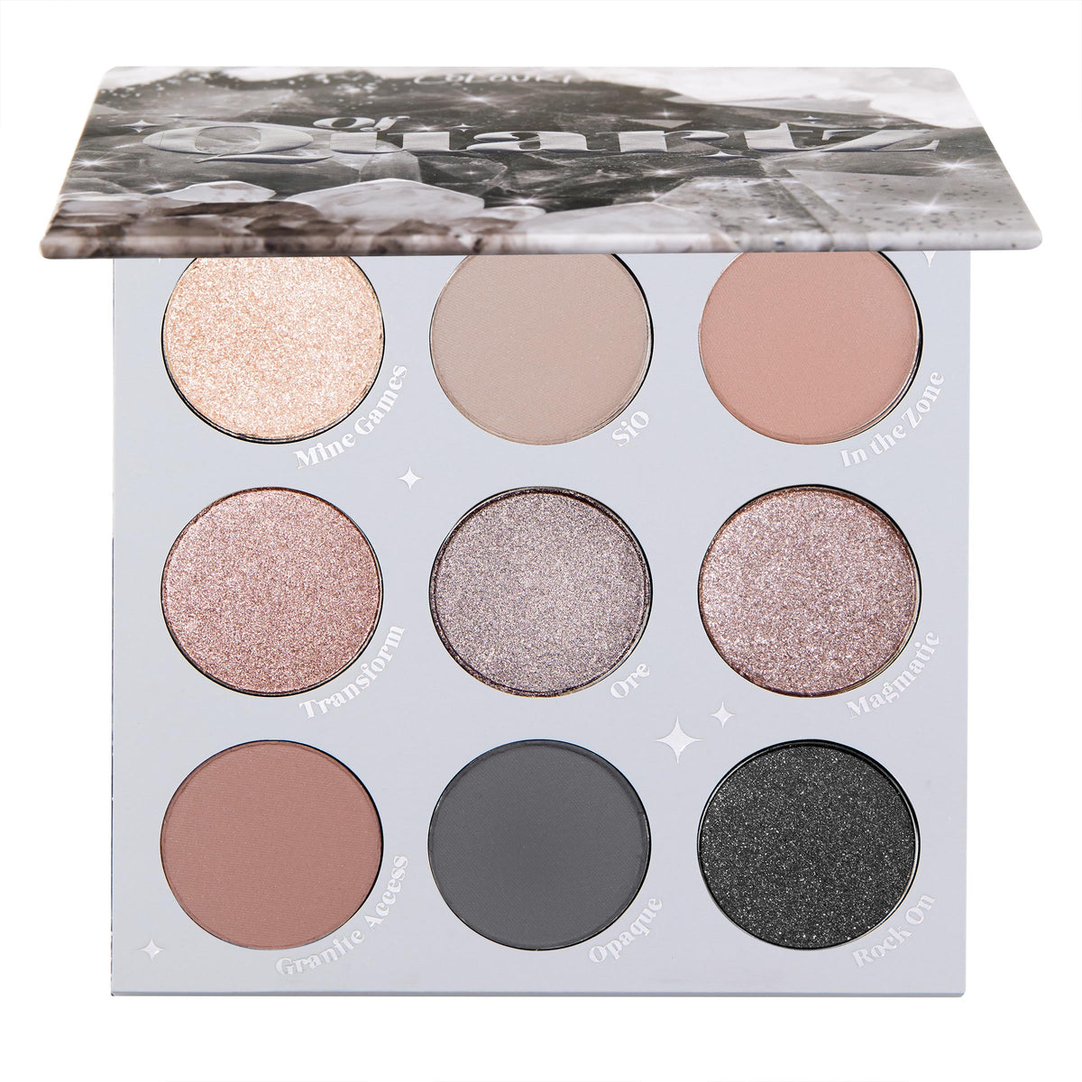 ColourPop Of Quartz shadow palette shown half-open, displaying nine cool-toned neutrals - champagne, rose, and mauve shimmers plus taupe, mauve, and charcoal mattes, with a black glitter shade Rock On - in a gray case with a quartz-pattern lid.