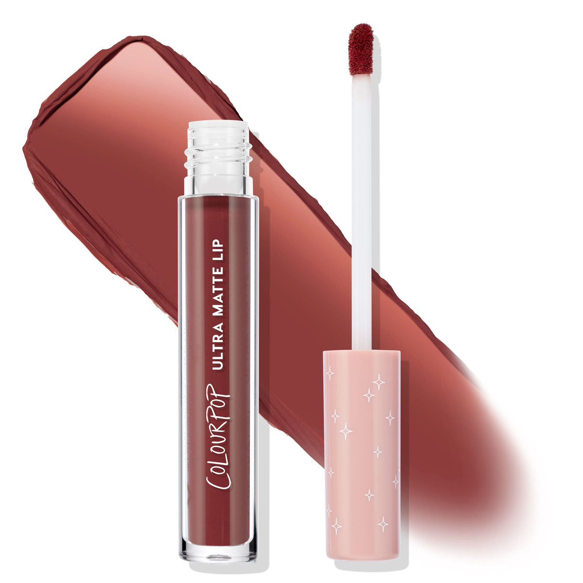 Off The Record ColourPop Ultra Matte Lip liquid lipstick shows an open clear tube and doe-foot applicator loaded with a rich brick-red shade, a wide swatch streaked behind, and a peach cap with star accents on a white background.