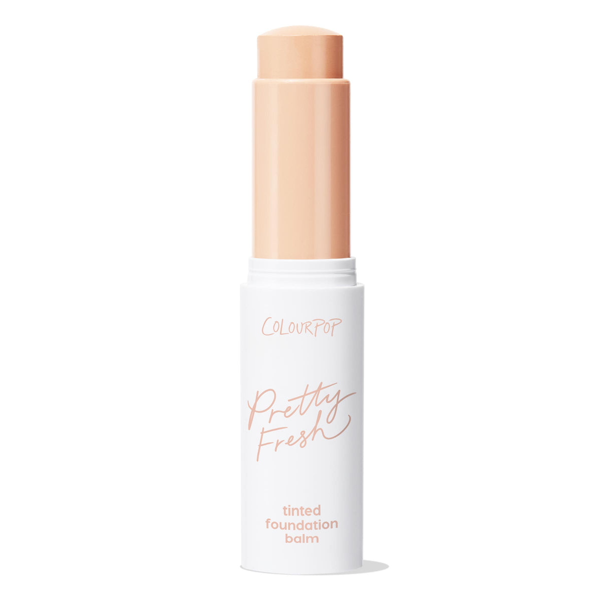 ColourPop Pretty Fresh Tinted Foundation Balm in shade Fair 1 stands upright with cap removed, twist-up stick raised to show a light fair-beige balm bullet in a white tube with peach lettering, centered on a plain white background.