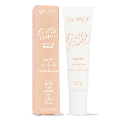 ColourPop Pretty Fresh Primer Set It Up stands upright, peach box next to a white 1 fl oz squeeze tube, highlighting peptides, niacinamide, and hyaluronic acid for smoothing and extended makeup wear against a clean white background.
