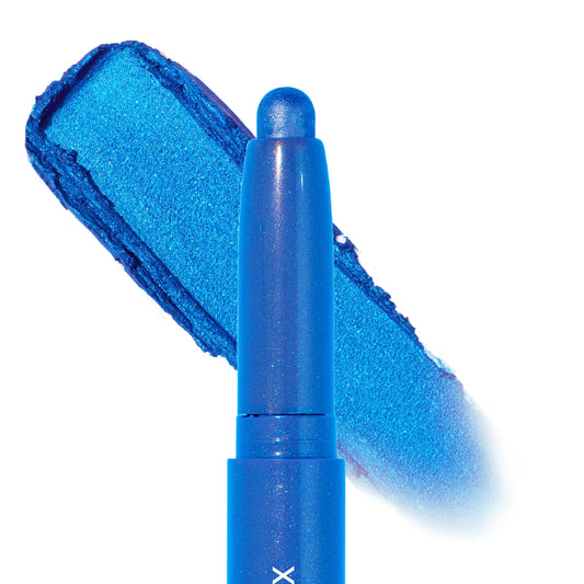 Rain Check Shadow Stix by ColourPop deposits a bold metallic cobalt-blue swatch behind the rounded tip, highlighting the creamy shimmer formula of this ColourPop Shadow Stix in a close-up studio shot on a white background.