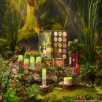 ColourPop X DreamWorks Shrek Full Collection Set showcasing an open 15-pan green-and-neutral eyeshadow palette, lip products, blush compacts with S logos, eyeliner, and highlighter, styled in a mossy swamp scene; ColourPop Full Collection Set.