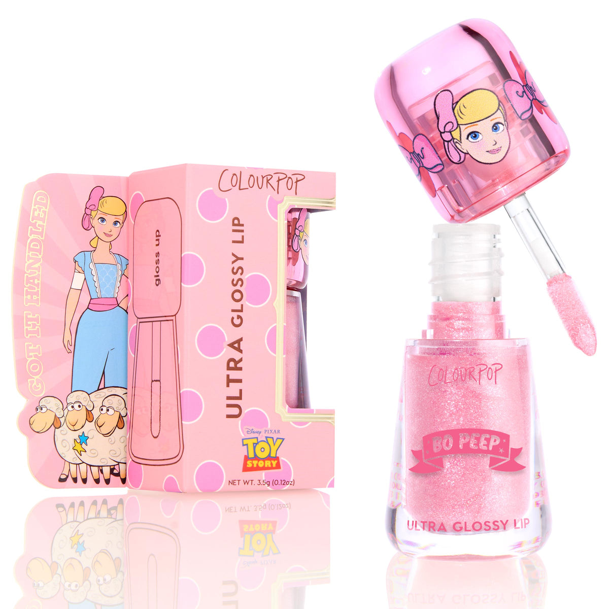 ColourPop Ultra Glossy Lip Peep This shows an open bottle with wand coated in shimmery light pink gloss; Bo Peep themed cap and glittery formula shine, with matching Toy Story box alongside to highlight packaging.