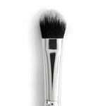 ColourPop Large Shader Brush makeup brush featuring dense, rounded black‑to‑white duo-fiber bristles and a polished silver ferrule, designed to pack and blend eyeshadow on lids, shown close-up on a white background.