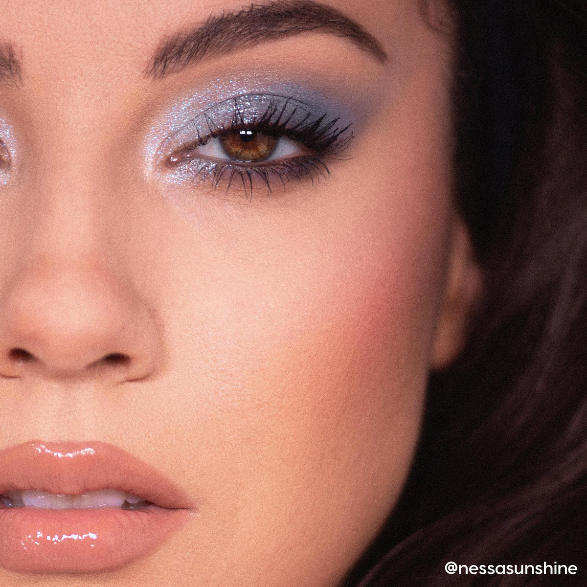 So Elemental ColourPop Shadow Palette creating a cool-toned, shimmery blue smoky eye with inner-corner highlight and lengthened lashes, shown in a close-up of a person’s eye and nude glossy lips under soft studio lighting.