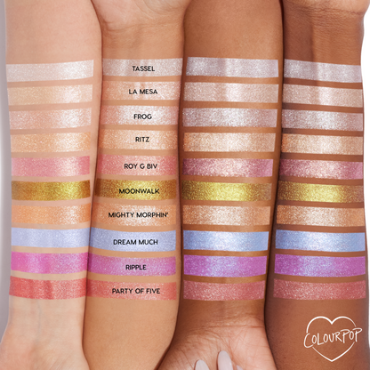 La Mesa ColourPop Super Shock Shadow swatched as a sheer champagne-beige shimmer across three arms in a lineup of labeled shades, showing its luminous, glittery finish and how the color reads on multiple skin tones.